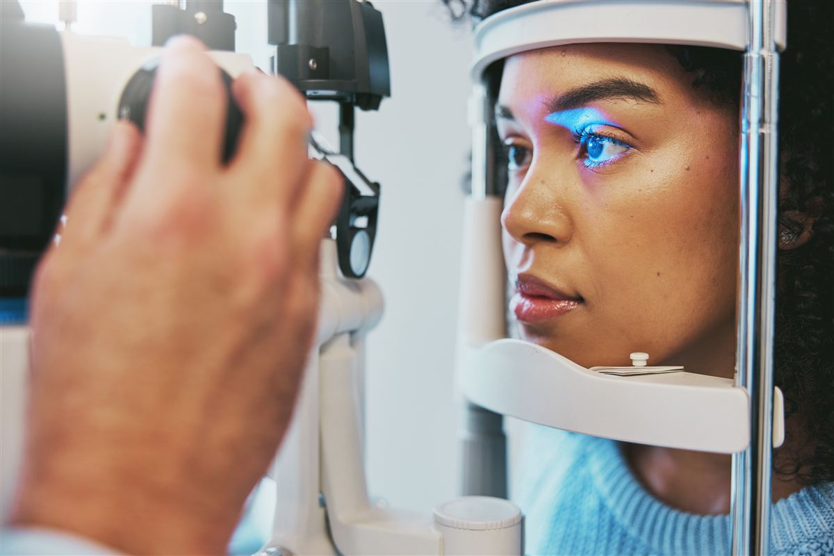A patient receives an eye exam